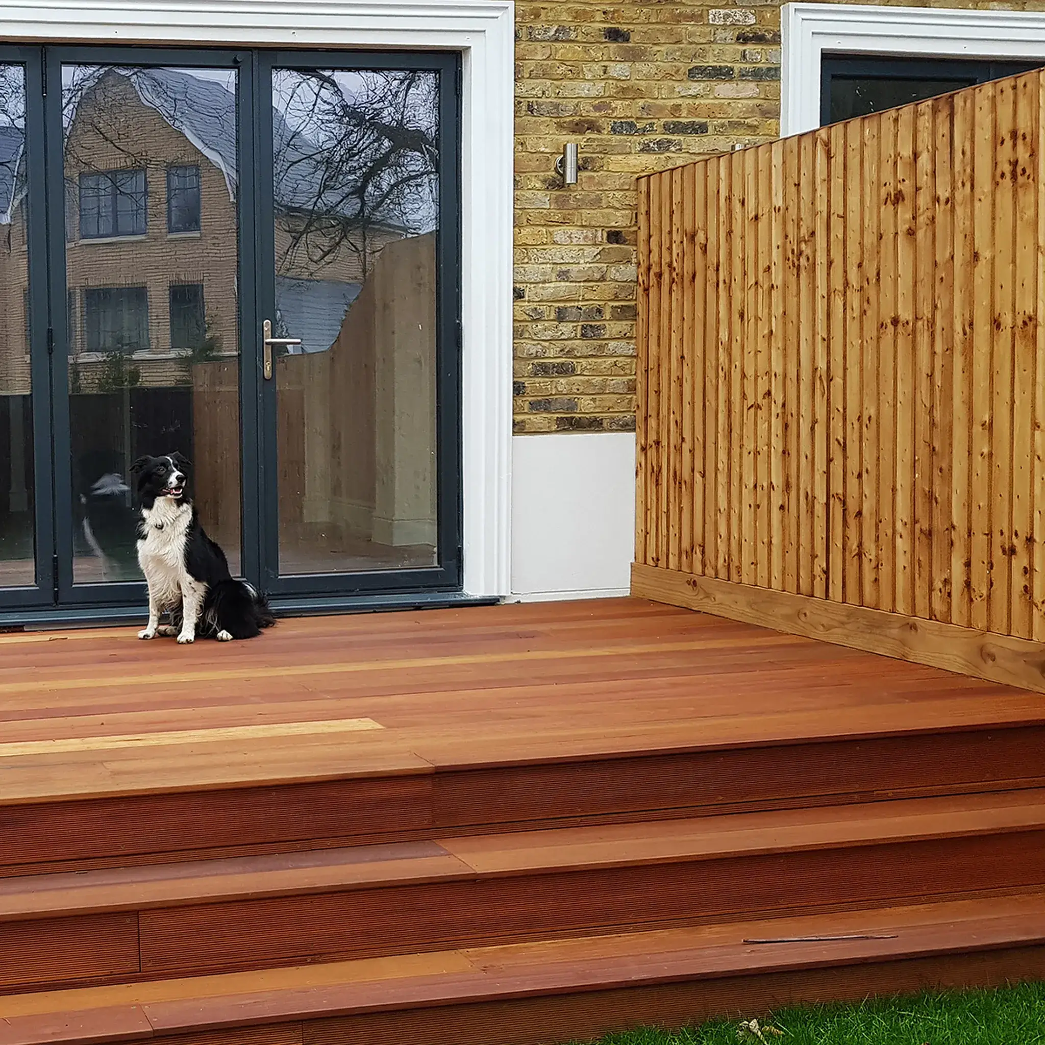 Finished composite deck with natural pine balustrade Leatherhead