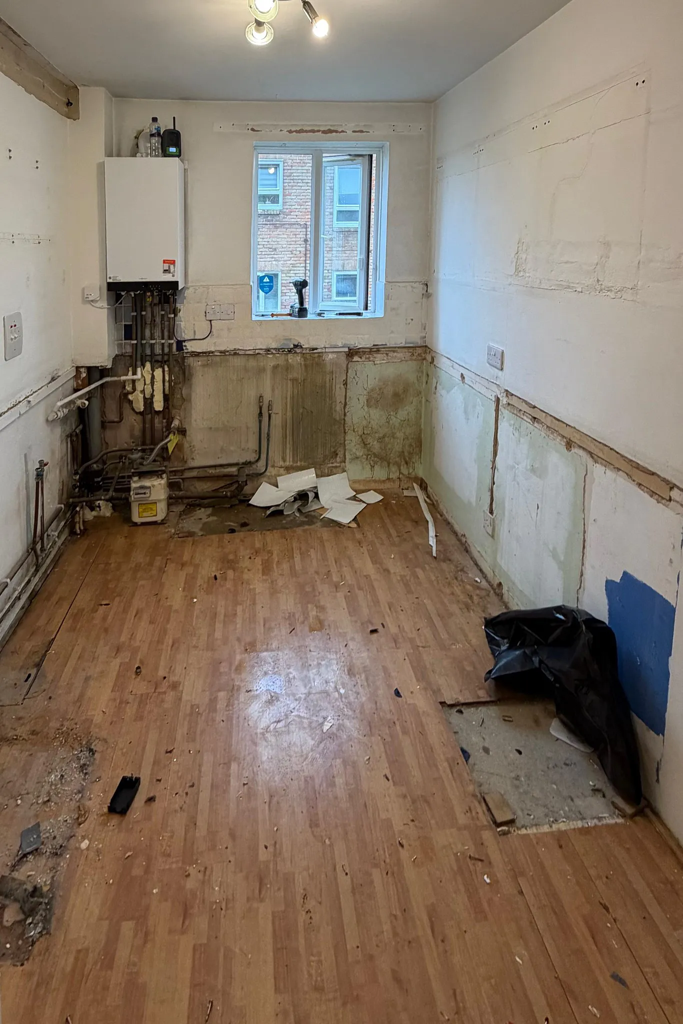Kitchen demolition and strip-out before bespoke fitted kitchen in Sutton