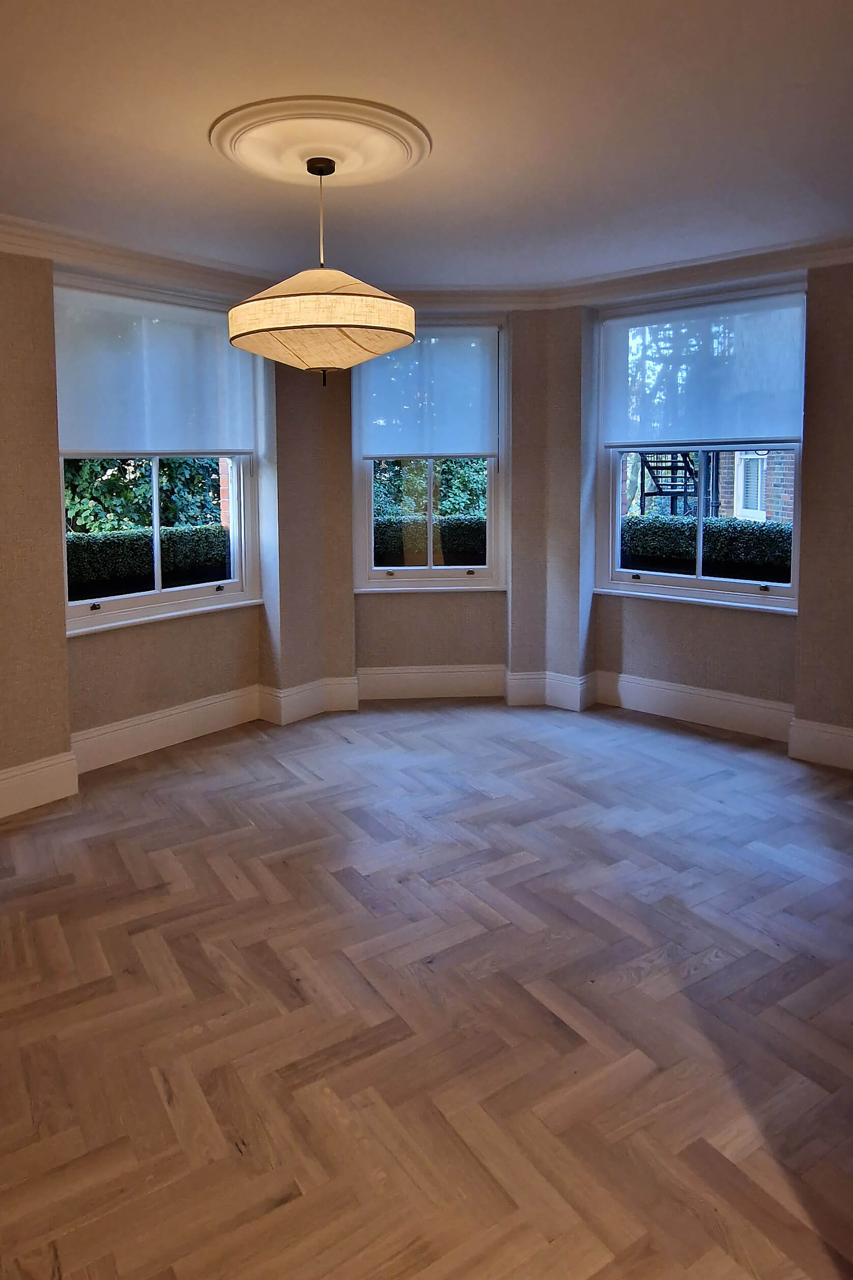 Herringbone parquet flooring, Chelsea SW10 Bay window reception room with herringbone parquet flooring, Chelsea SW10