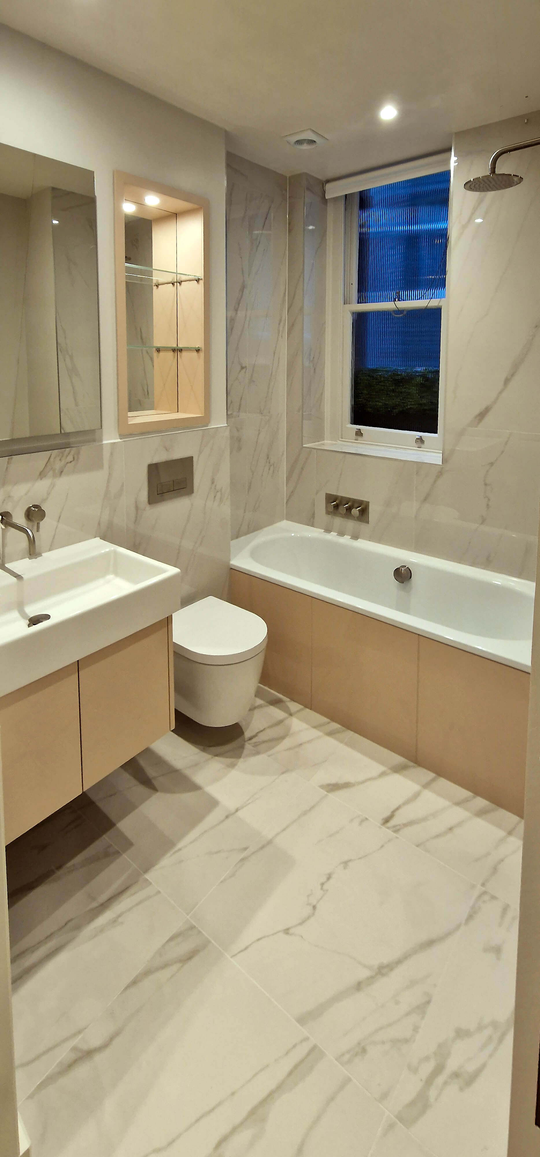 Marble bathroom with heated towel rail, Chelsea SW10 Marble bathroom with freestanding bath and heated towel rail, Chelsea SW10