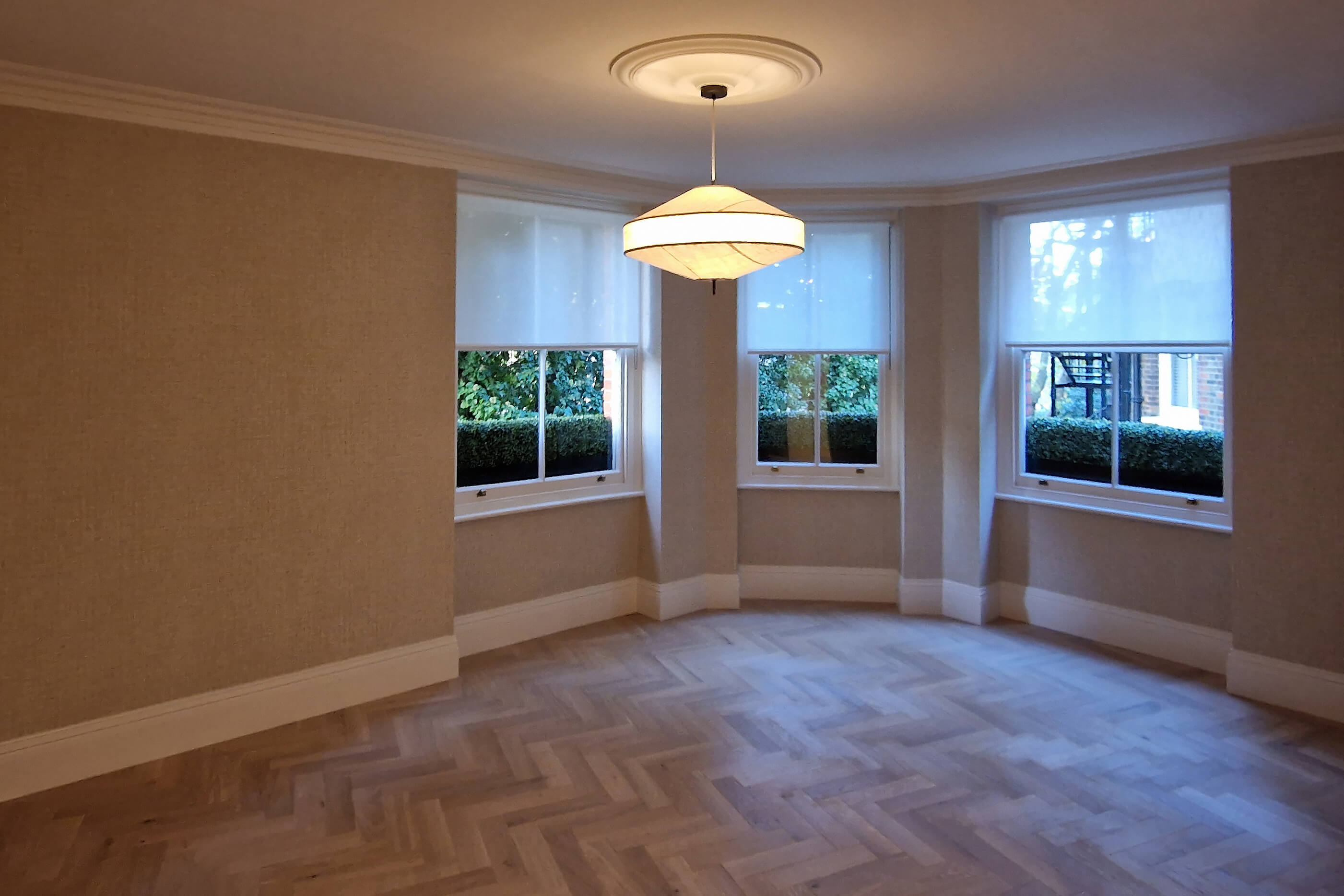 Reception room, part of the whole-flat renovation, Chelsea SW10 Reception room bay window with parquet flooring, Chelsea SW10