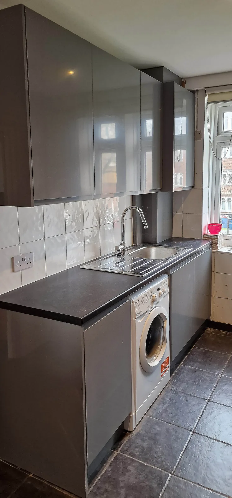 Fitted kitchen sink run with integrated washing machine in Carshalton SM5