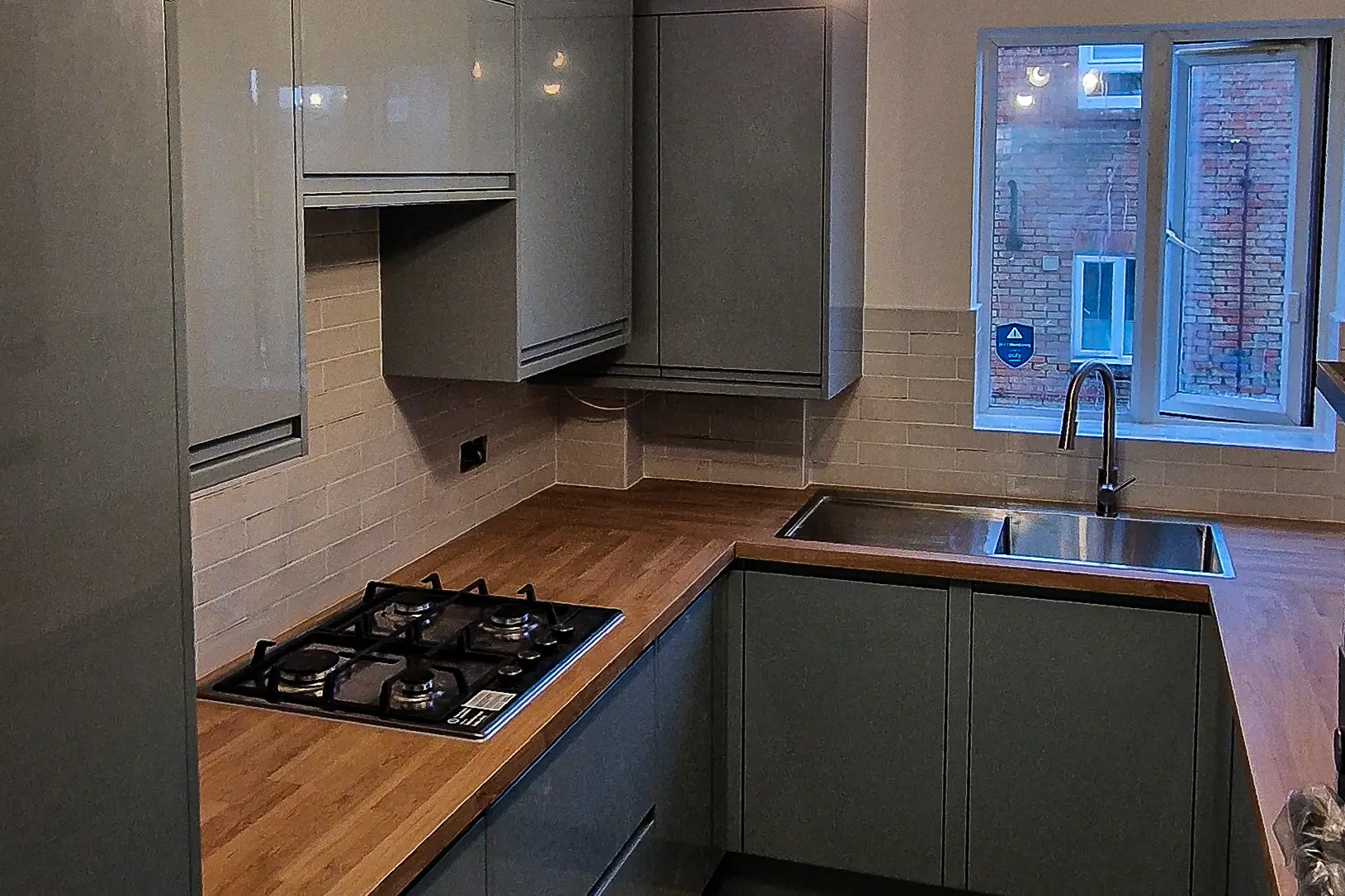 U-shaped kitchen installation - Surrey